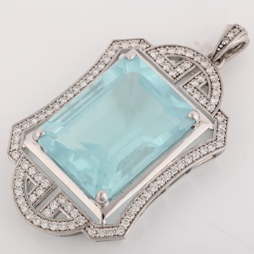 1123 - A large modern 18ct white gold aquamarine and diamond openwork pendant, set with 30ct rectangular st... 