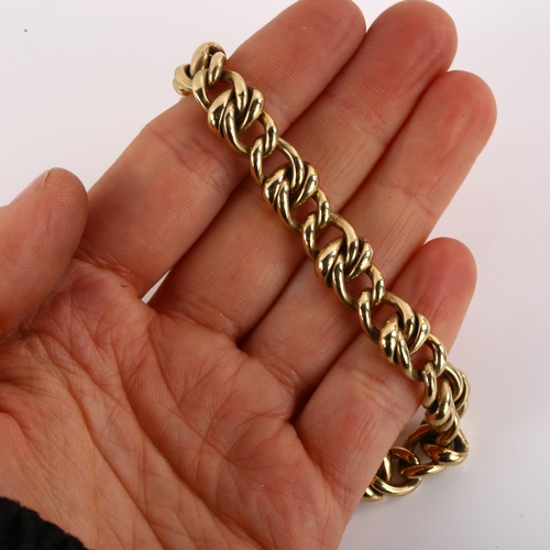 1127 - A heavy 9ct gold curb link chain bracelet, bracelet length 21cm, 42g