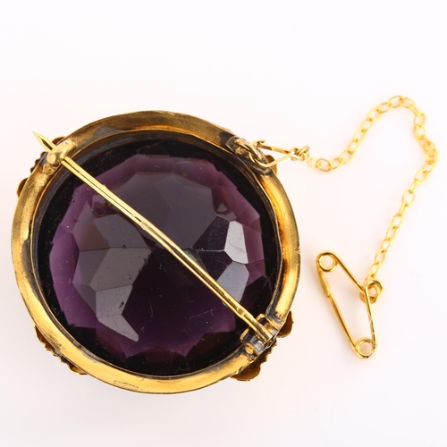 1130 - A large Victorian amethyst brooch, unmarked gold frame set with round-cut amethyst, brooch diameter ... 