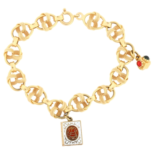 1137 - An Italian 18ct gold fancy link charm bracelet, with enamel Koran charm, bracelet length 20cm, 21.3g