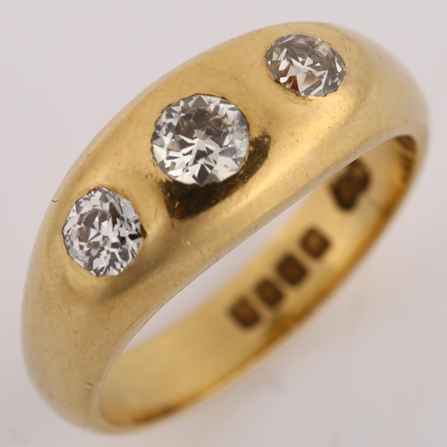 1141 - An early 20th century 18ct gold three stone diamond gypsy ring, set with old European-cut diamonds, ... 