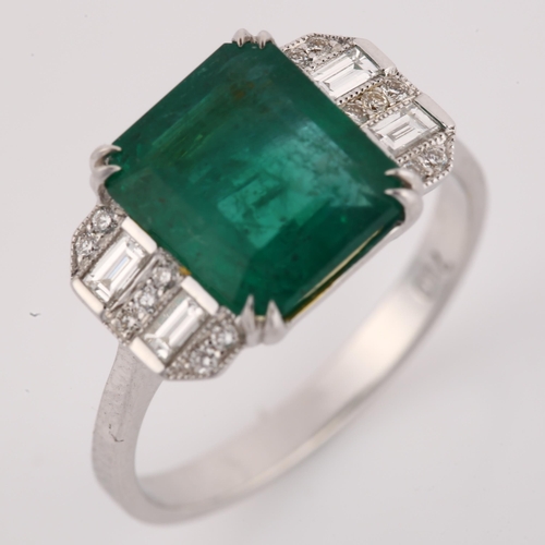 1142 - A modern 18ct white gold emerald and diamond ring, in Art Deco style, set with 2.5ct emerald-cut eme... 