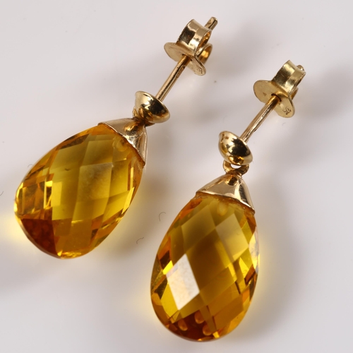 1145 - A pair of citrine briolette drop earrings, with unmarked yellow metal stud fittings, earring height ... 