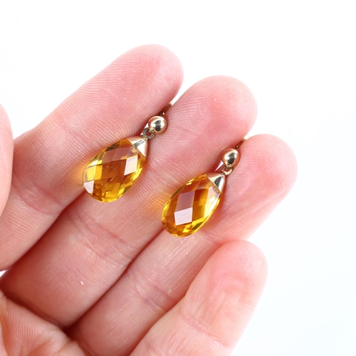 1145 - A pair of citrine briolette drop earrings, with unmarked yellow metal stud fittings, earring height ... 