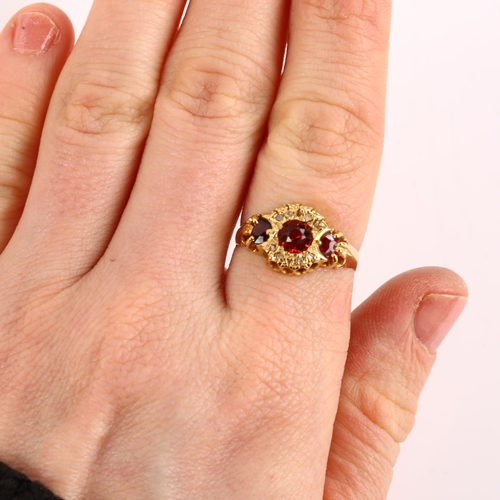 1146 - An early 20th century 18ct gold garnet and diamond cluster half hoop ring, set with round-cut garnet... 