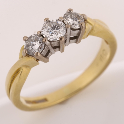 1150 - **WITHDRAWN** An 18ct gold three stone diamond ring, set with modern round brilliant-cut diamonds, t... 