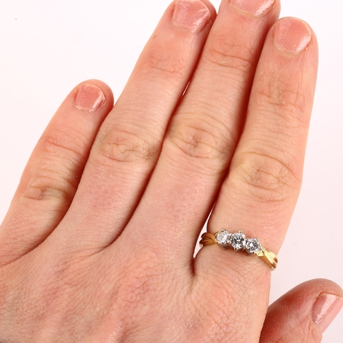 1150 - **WITHDRAWN** An 18ct gold three stone diamond ring, set with modern round brilliant-cut diamonds, t... 