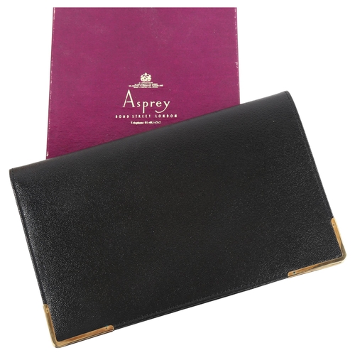 1152 - ASPREY - a late 20th century 9ct gold mounted black leather wallet, stamped Asprey London, hallmarks... 