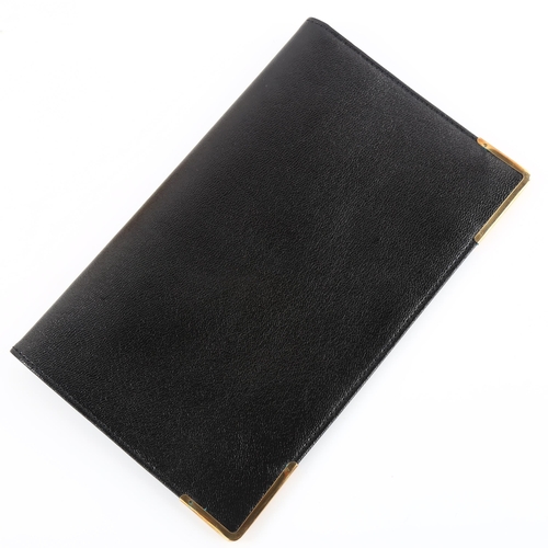 1152 - ASPREY - a late 20th century 9ct gold mounted black leather wallet, stamped Asprey London, hallmarks... 