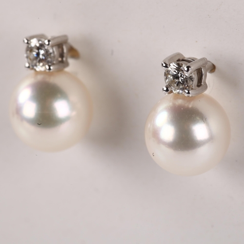 1156 - A pair of 18ct white gold whole pearl and diamond earrings, with stud fittings, earring height 10.2m... 