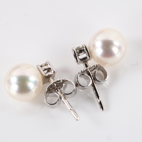 1156 - A pair of 18ct white gold whole pearl and diamond earrings, with stud fittings, earring height 10.2m... 