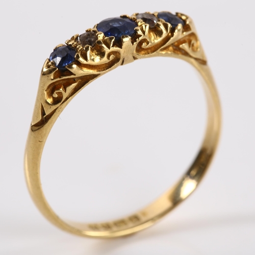 1161 - An early 20th century 18ct gold graduated five stone sapphire and diamond half hoop ring, hallmarks ... 