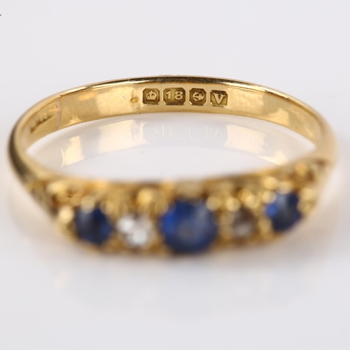 1161 - An early 20th century 18ct gold graduated five stone sapphire and diamond half hoop ring, hallmarks ... 