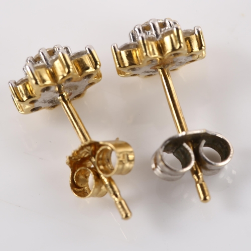 1162 - A pair of 18ct gold diamond flowerhead earrings, with stud fittings, earring diameter 6.5mm, 1.5g