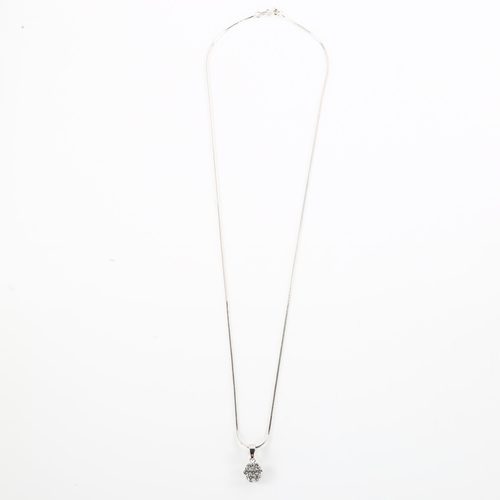 1164 - A modern diamond cluster flowerhead pendant necklace, unmarked white gold settings with modern round... 