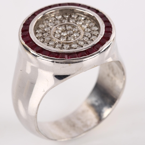 1166 - A large modern 18ct white gold ruby and diamond cluster target ring, set with calibre-cut rubies and... 