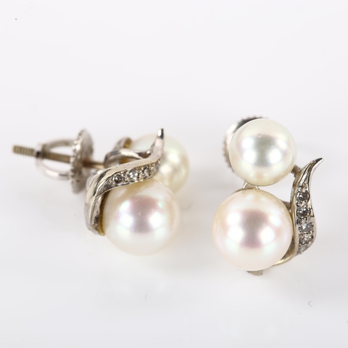 1169 - A pair of 14ct white gold whole cultured pearl and diamond earrings, with screw-back fittings, earri... 