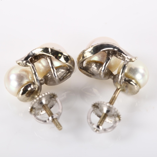 1169 - A pair of 14ct white gold whole cultured pearl and diamond earrings, with screw-back fittings, earri... 