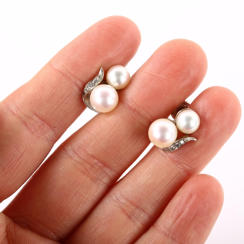 1169 - A pair of 14ct white gold whole cultured pearl and diamond earrings, with screw-back fittings, earri... 