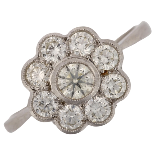 1177 - A platinum diamond cluster flowerhead ring, set with modern round brilliant-cut diamonds, total diam... 