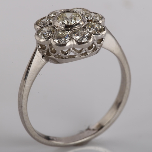 1177 - A platinum diamond cluster flowerhead ring, set with modern round brilliant-cut diamonds, total diam... 