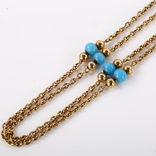 1178 - An Antique cable link long guard chain necklace, unmarked gold settings test as 9ct with blue bead s... 