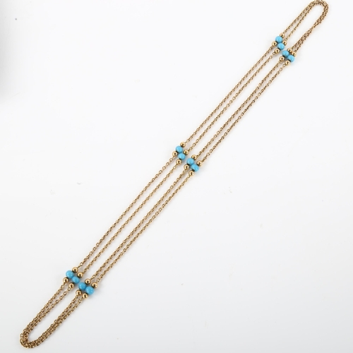 1178 - An Antique cable link long guard chain necklace, unmarked gold settings test as 9ct with blue bead s... 