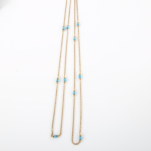 1178 - An Antique cable link long guard chain necklace, unmarked gold settings test as 9ct with blue bead s... 