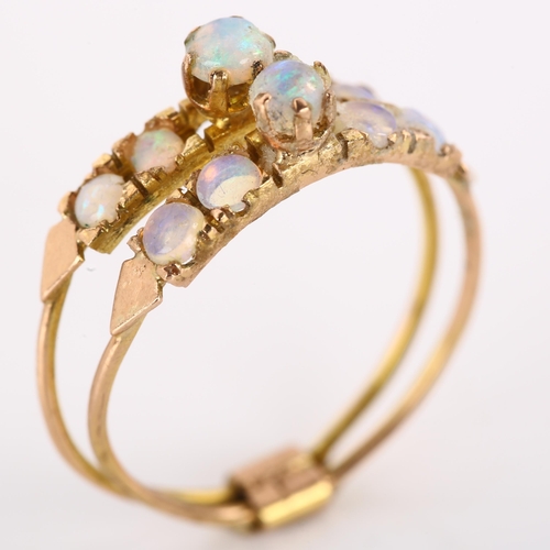 1186 - A Middle Eastern 14ct rose gold opal harem double-band ring, set with round cabochon opal, overall s... 