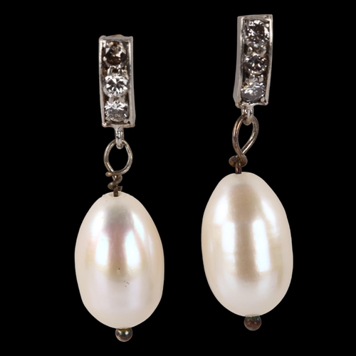 1193 - A pair of freshwater pearl and diamond drop earrings, with stud fittings, earring height 28.2mm, 3.6... 