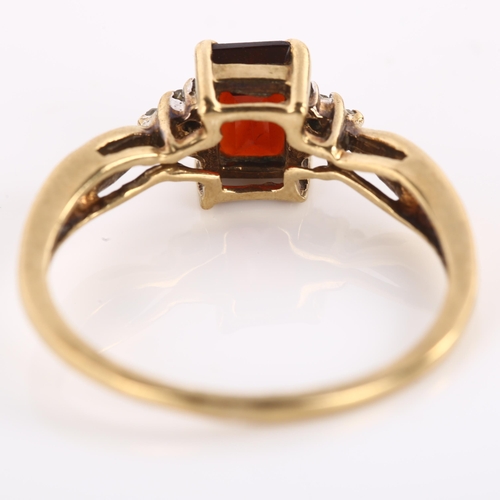 1197 - A modern 9ct gold garnet and diamond dress ring, setting height 7.4mm, size O, 2.1g