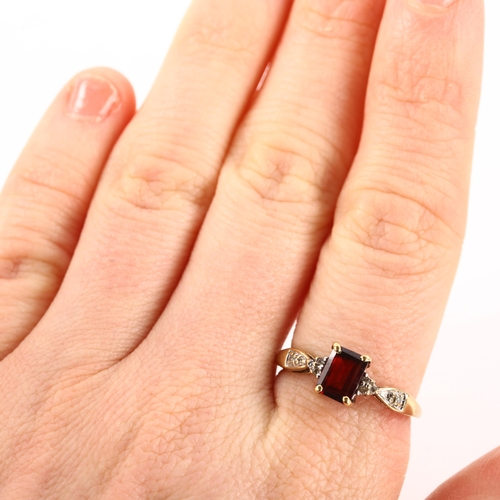 1197 - A modern 9ct gold garnet and diamond dress ring, setting height 7.4mm, size O, 2.1g