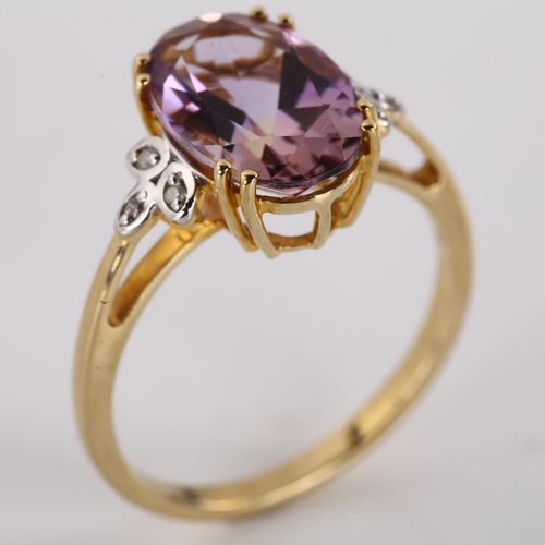 1202 - A modern 9ct gold ametrine and diamond dress ring, set with oval mixed-cut ametrine and single-cut d... 