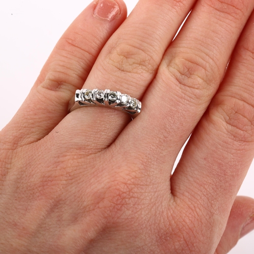 1203 - A five stone diamond ring, unmarked white gold settings with modern round brilliant-cut diamonds, to... 