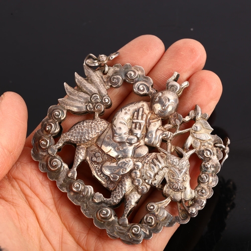 1370 - A large Chinese export silver Qilin amulet pendant, double-sided relief embossed decoration depictin... 