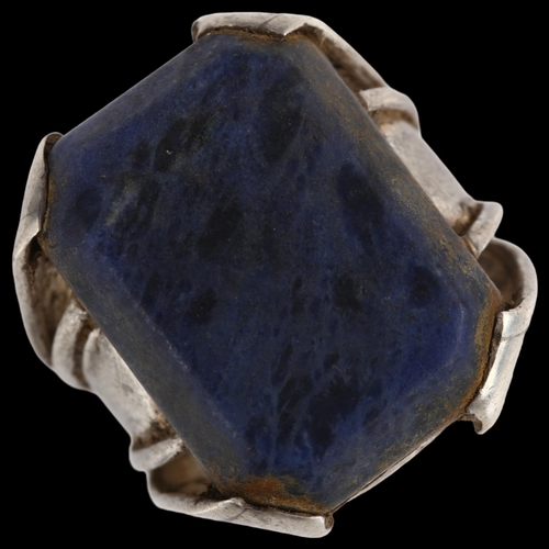 1374 - A large Indian silver sodalite dress ring, setting height 26.7mm, size approx G, 14.7g