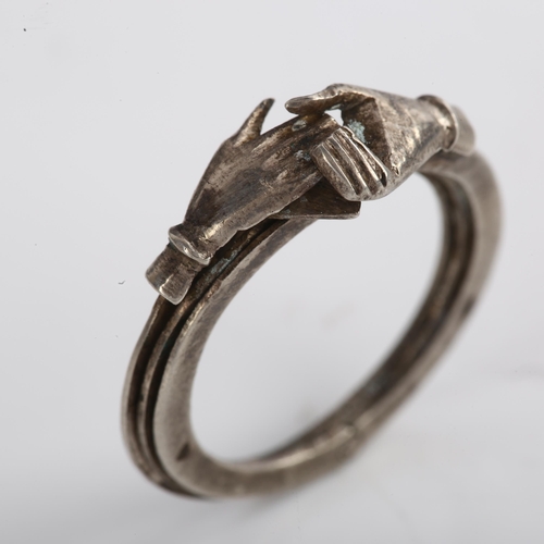 1378 - A 19th century Fede and triple hoop Gimmel ring, unmarked silver settings composed of 3 conjoined ho... 