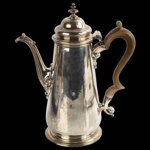 1517 - A George II silver coffee pot, tapered cylindrical form with turned wood handle and scrolled acanthu... 