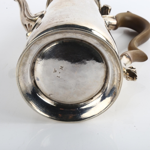 1517 - A George II silver coffee pot, tapered cylindrical form with turned wood handle and scrolled acanthu... 