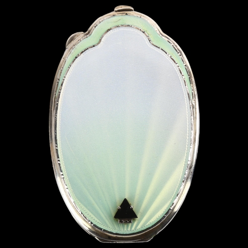 1523 - An Art Deco Edward VIII silver and enamel compact, with guilloche sunburst and blue and green ombre ... 