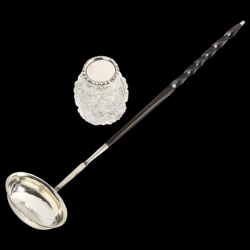 1533 - An Antique silver and twisted whale baleen toddy ladle, and a silver-mounted glass inkwell (2)