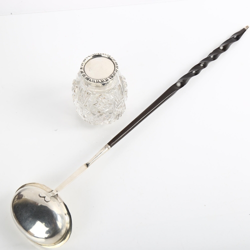 1533 - An Antique silver and twisted whale baleen toddy ladle, and a silver-mounted glass inkwell (2)