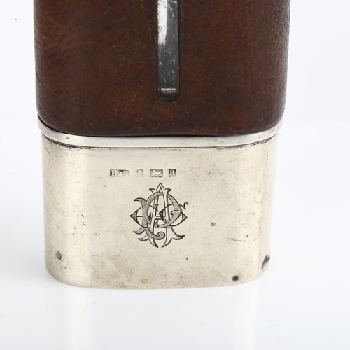 1538 - A leather-mounted glass hip flask, with silver plated cap and silver beaker, height 15cm