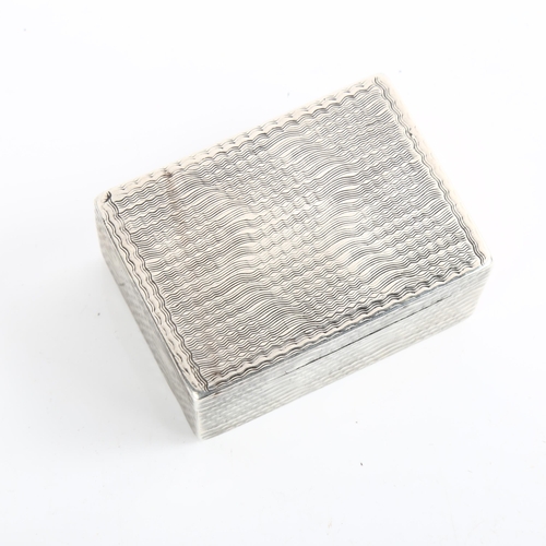 1544 - An Antique French? silver snuffbox, rectangular form with allover engine turned decoration, 7cm x 5c... 