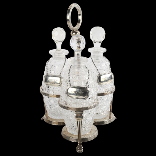 1551 - A silver plated 3-bottle tantalus, with ovoid decanters and silver labels, overall height 32cm