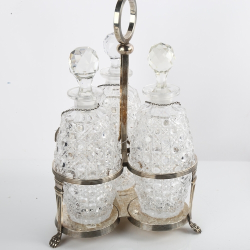 1551 - A silver plated 3-bottle tantalus, with ovoid decanters and silver labels, overall height 32cm