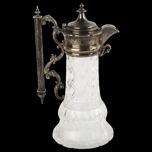 1552 - A Victorian silver plated glass Claret jug, height 28cm