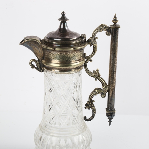 1552 - A Victorian silver plated glass Claret jug, height 28cm