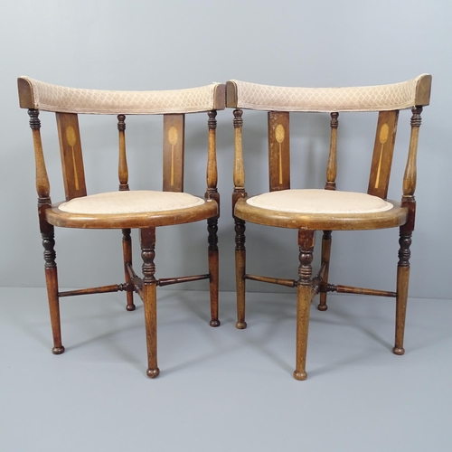 2001 - A pair of antique Arts & Crafts mahogany and satinwood-inlaid corner hall chairs.