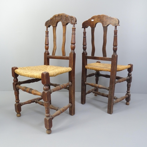 2006 - A set of four French rush seated farmhouse dining chairs.